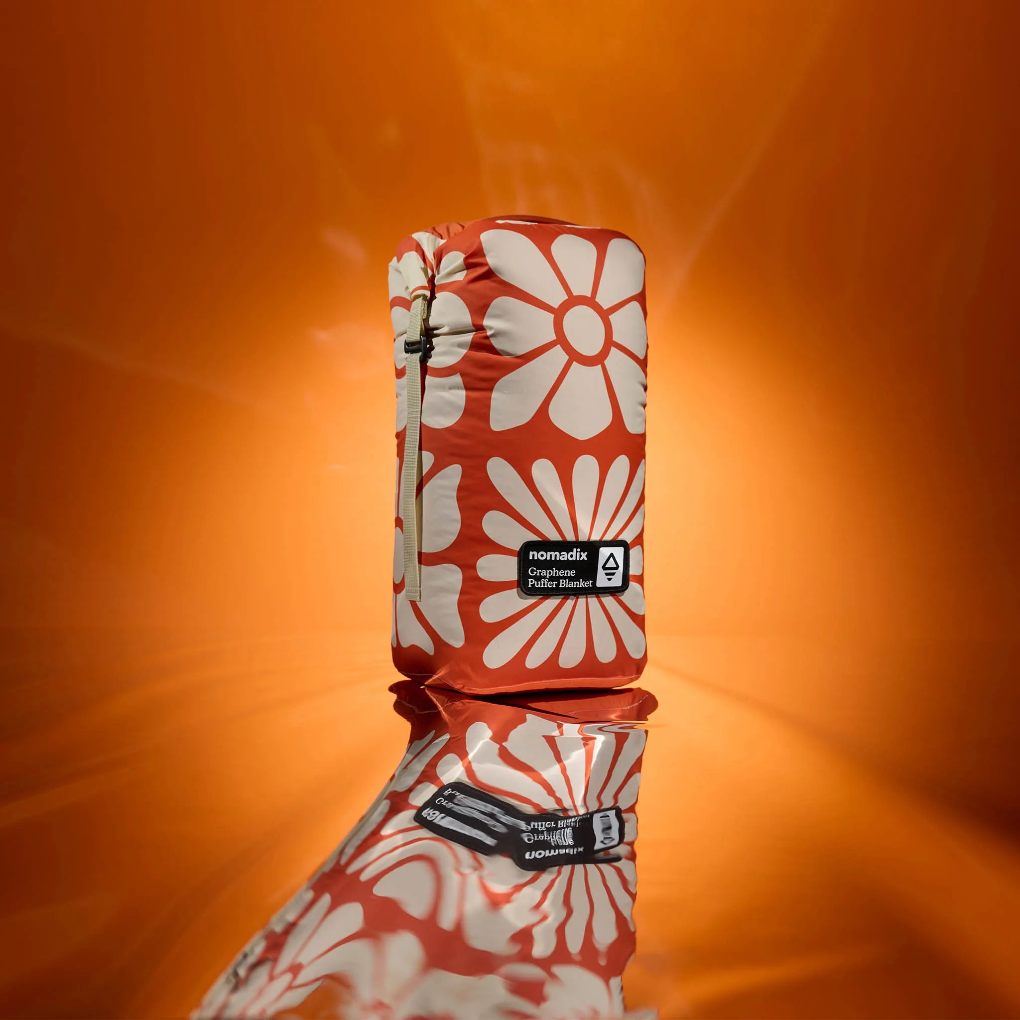Graphene Puffer Blanket: Big Flowers Expedition Orange – Nomadix